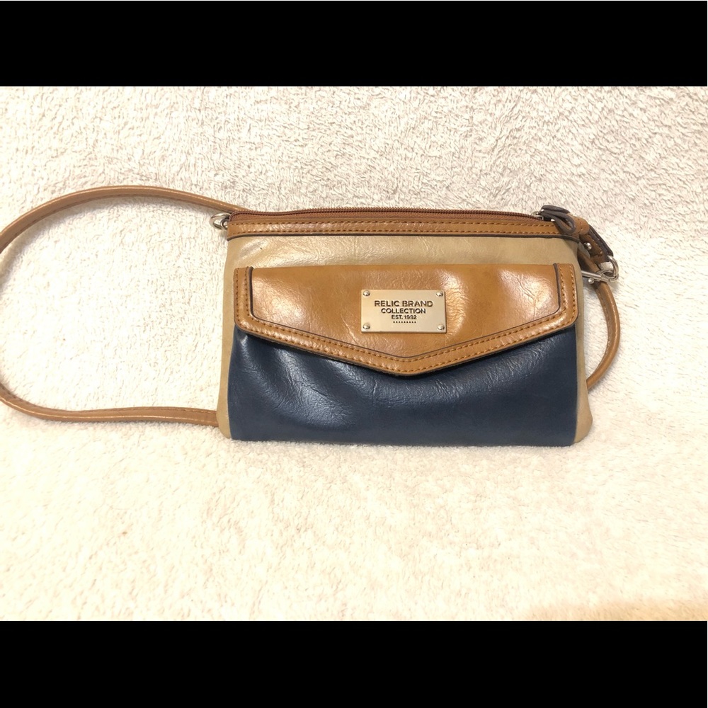 Navy blue and tan crossbody bag